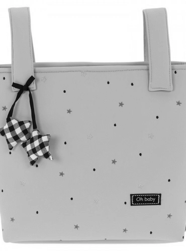 Gray faux leather satchel bag with black embroidered stars. Nuria Model