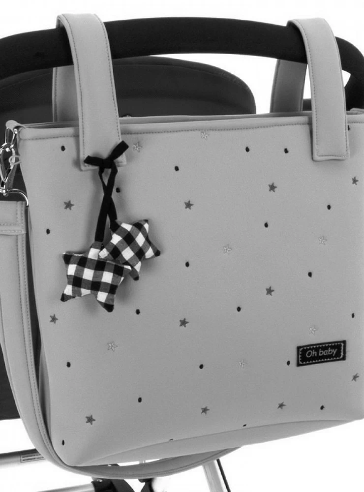 Gray faux leather satchel bag with black embroidered stars. Nuria Model