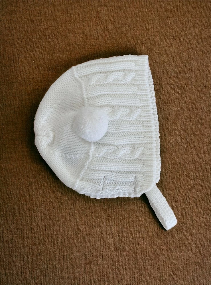Knitted winter bonnet for baby