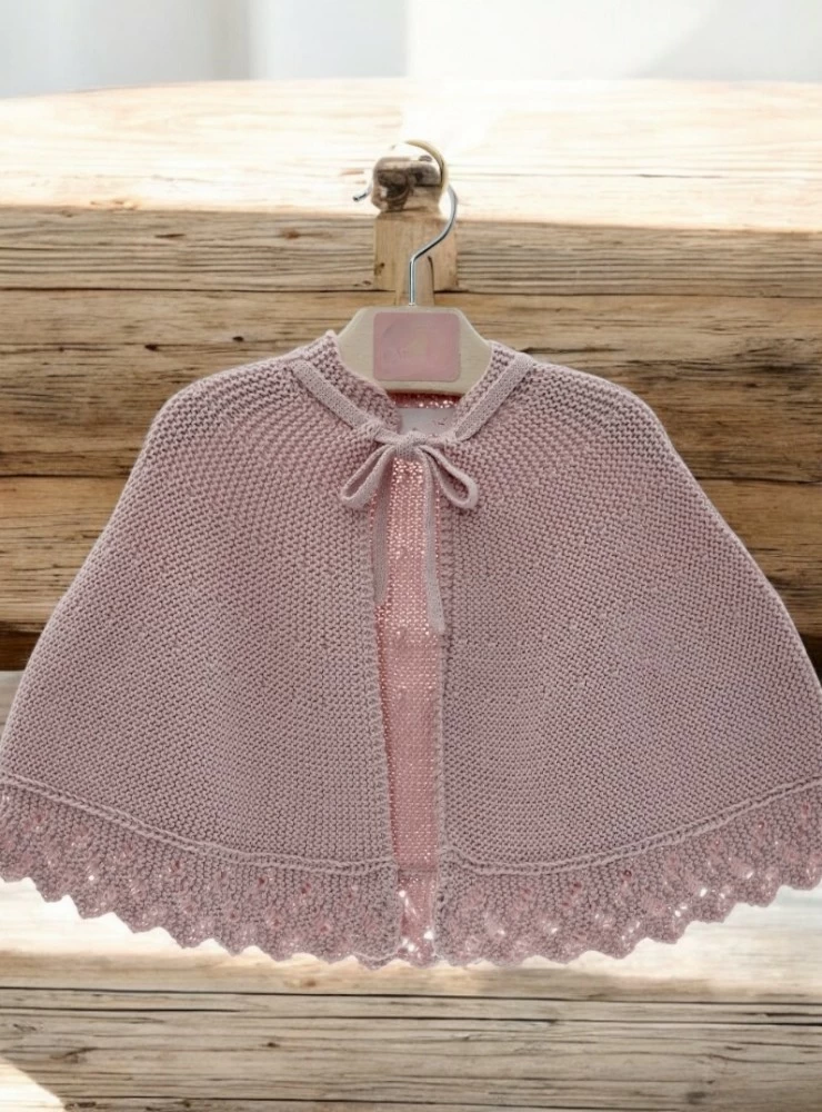 Powder pink fine knit cape.