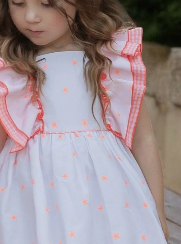 Vestido blanco y naranja con estrellas y cuadro vichy